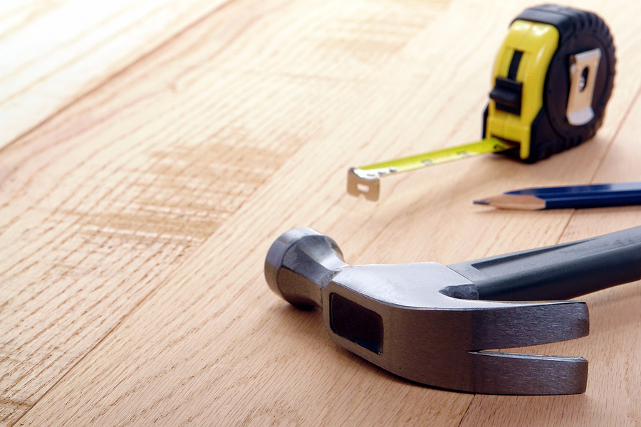 Carpenter Tools With Hammer And Tape Measure