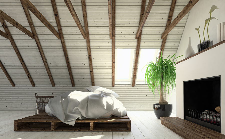 Light attic bedroom in white.