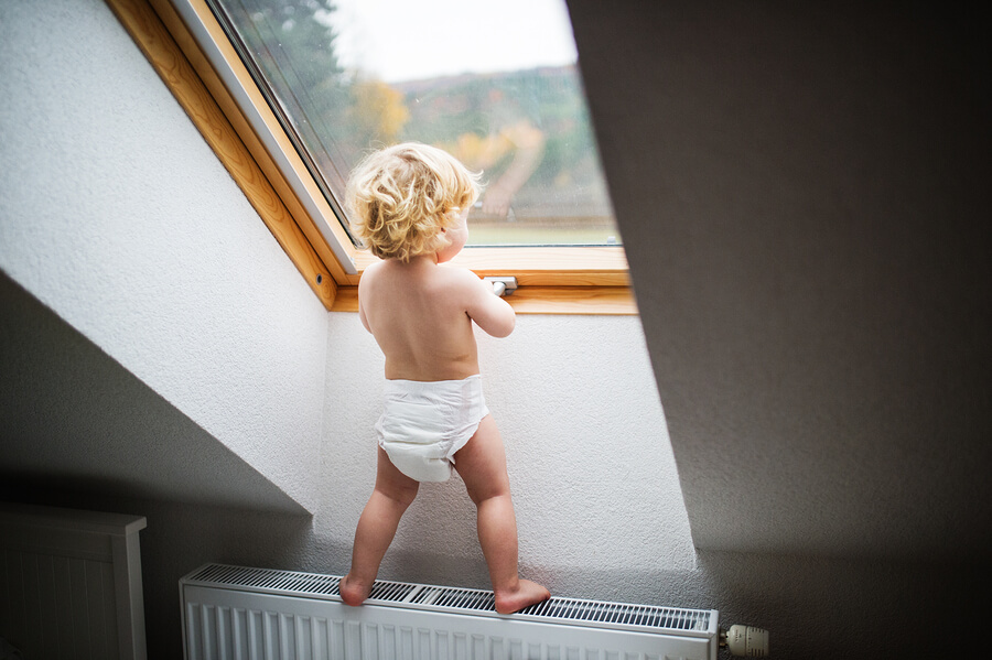 Baby by the window
