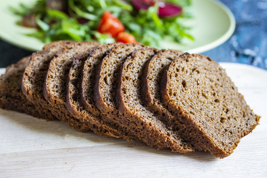Sliced Hovis bread on a chopping board.